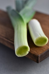 Fresh leek on a wooden board