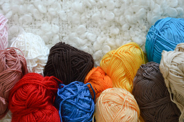 multi-colored yarn. threads for knitting and crocheting. a beautiful skein. background for the design.