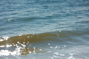 Naklejka premium Close-up of sand on the beach and water of the Yarovoe salt lake (Altai Territory).