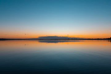 Dawn colour with reflection in the lake.