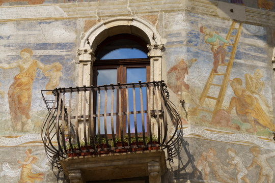 Trento, Italy: painted facade of historic buildings in the cathedral square