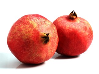Fototapeta na wymiar Pomegranata Fruit, punica granatum against White Background