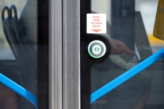 Open The Door. Green Button For Opening Doors In The Subway And Bus. Button To Stop Transport. Push Here To Open Door