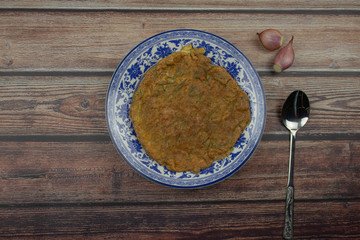 omelet on the wooden background