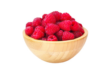 Selected raspberry in a wooden bowl isolated on white background