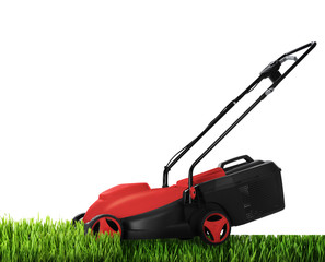 Modern garden lawn mower cutting green grass, white background