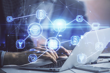 Social network theme hologram with businessman working on computer on background. Concept of world wide web. Double exposure.