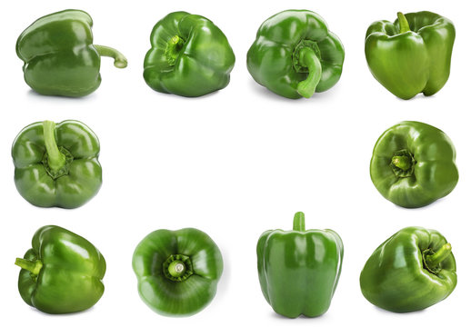 Frame of whole green bell peppers on white background
