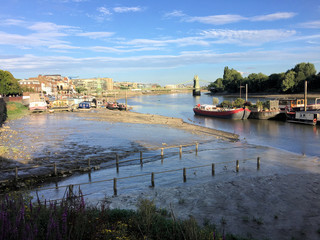 A view of the River Thames at Hamersmith in the eveing near the bridge