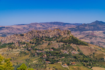 Fototapeta na wymiar Panoramic view of the amazing medieval stone town of Leonforte on the hill in the province of Enna, Sicily, Italy