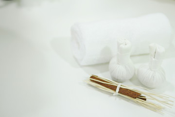 Herbal compress for body spa,Spa accessories,Beautiful composition of spa , spa relax concept,  herbs for massage, beautiful spa set on wood table,For marketing products
