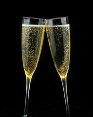 Glasses of Champagne against Black Background