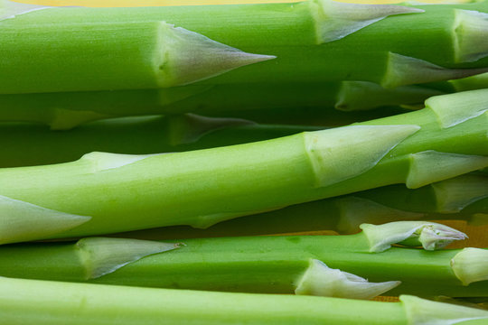 Green Background From Fresh Asparagus. Macro Photography Of Plants And Food. Backgrounds And Textures.