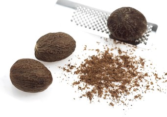 Nutmeg, myristica fragrans, Fruit, Powder and Grater against White Background
