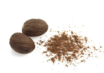Nutmeg, myristica fragrans, Fruit and Powder against White Background