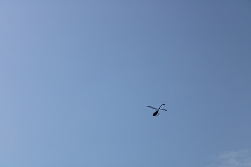 helicopter in clear blue sky wallpaper background