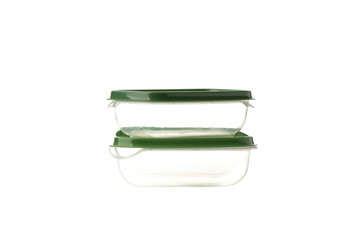 Two transparent plastic containers for food isolated on a white background.