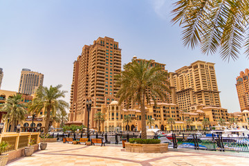 Fototapeta na wymiar Buildings overlooking the Marina in Doha.