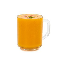 Fresh mango fruit juice on white background
