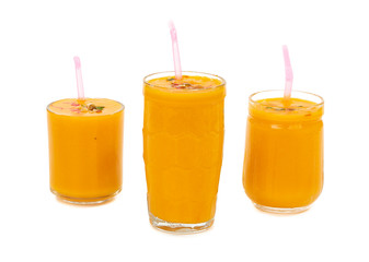 Fresh mango fruit juice on white background