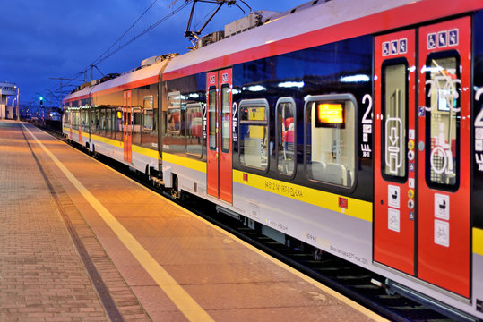 Passenger train at the station. Koluszki, Poland.	