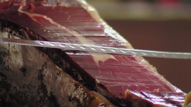 Cutting jabugo ham.