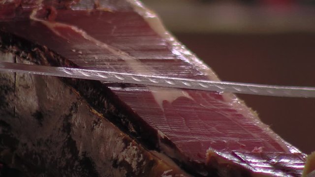 Cutting jabugo ham.