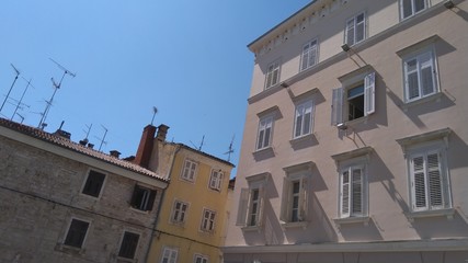 Fototapeta na wymiar old pastel buildings in the city