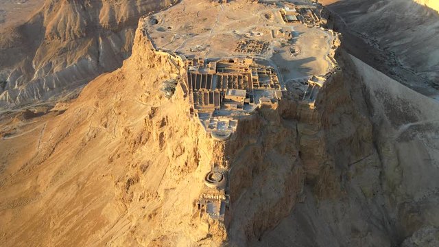 Aerial view of the ruins of Massada is a fortress built by Herod the Great on a cliff-top off the coast of Dead Sea. Destroyed by the Romans in the 1st century AD e. In the UNESCO World Heritage List