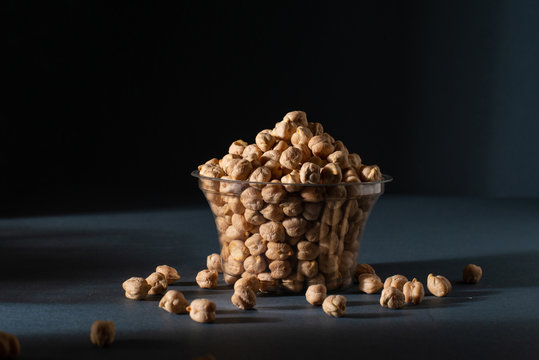 Dried chickpeas in glass pot, photography