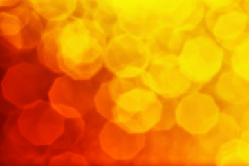 Bright hexagonal dark red and yellow color light bokeh