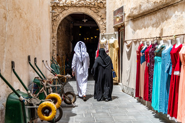 Local people of Doha going about their daily lives.