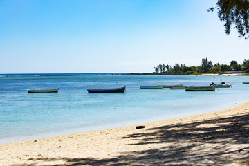 boats on the beach in Mauritius.