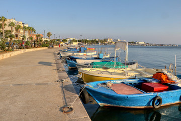 Fototapeta na wymiar Boats moored at the port of Porto Cesareo, Lecce, Salento, Puglia, Italy