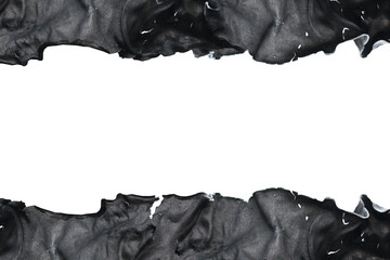 black frame made of burnt paper. Torn edges.