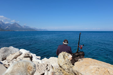 Fisherman by the sea