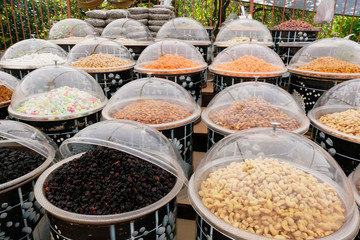 Sale of dried fruits and nuts on the market