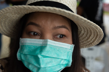 Traveler woman wearing face mask.