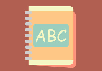 Agenda con letras del abecedario en fondo rojo.