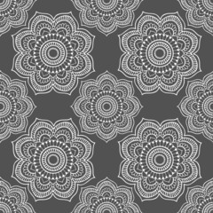 seamless pattern, abstraction in monochrome colors, mandala, ornament for wallpaper and fabric, wrapping paper, background for different designs