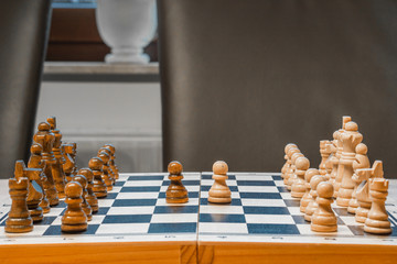 black and white chessboard with chessmen (game)