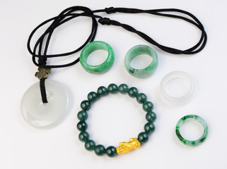 Group of jade jewelry on white background