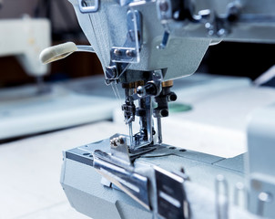 Fabric industry production line. Textile factory. Working tailoring process