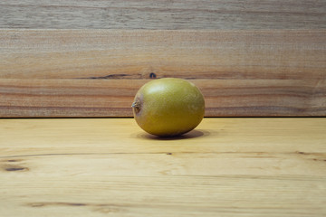 kiwi fruit on a wooden table