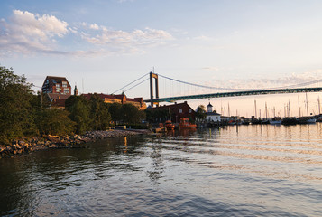 Bridge and harbor landscape, evening