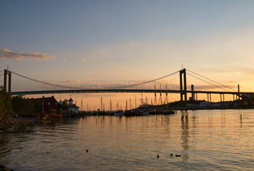 Fototapeta na wymiar Bridge and harbor landscape, evening