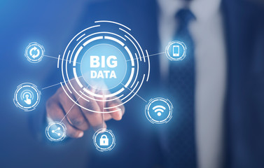 Businessman pushing with Big Data button with computer pictograms, creative collage