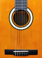 wood texture of lower deck of six strings acoustic guitar