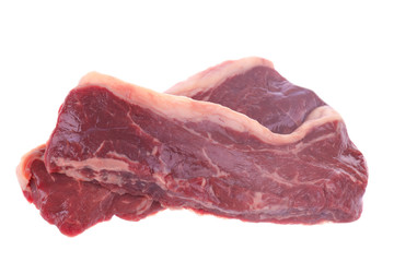 two slices of beef isolated on white background