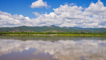 Beautiful landscape with the river and the blue sky.